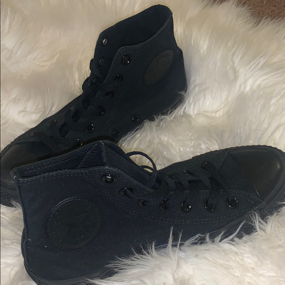 All black Chuck Taylor’s